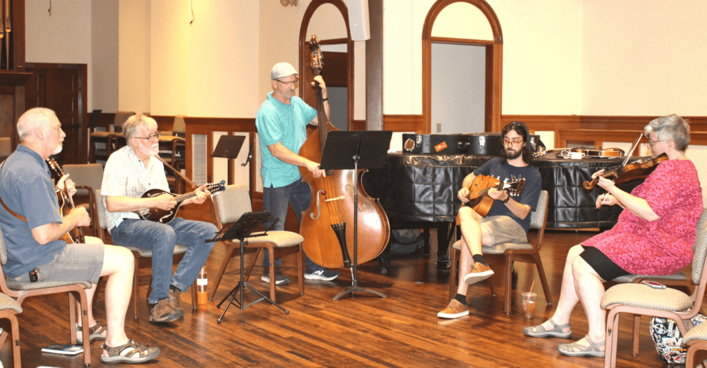 Bluegrass jamming: learn rhythm, leads, cues. Join local jam sessions, festivals. 10-week course, connect with roots music community.