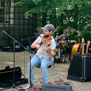 CCM Faculty Member and multi-instrumentalist Max Anderson performed bluegrass, folk, and classic tunes at this year's West Concord Porchfest.