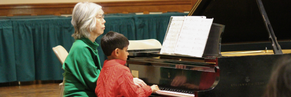 CCM faculty member Chieko Loy with student at a CCM recital